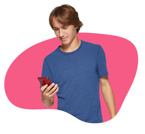 Teenage Boy with Acne looking at phone
