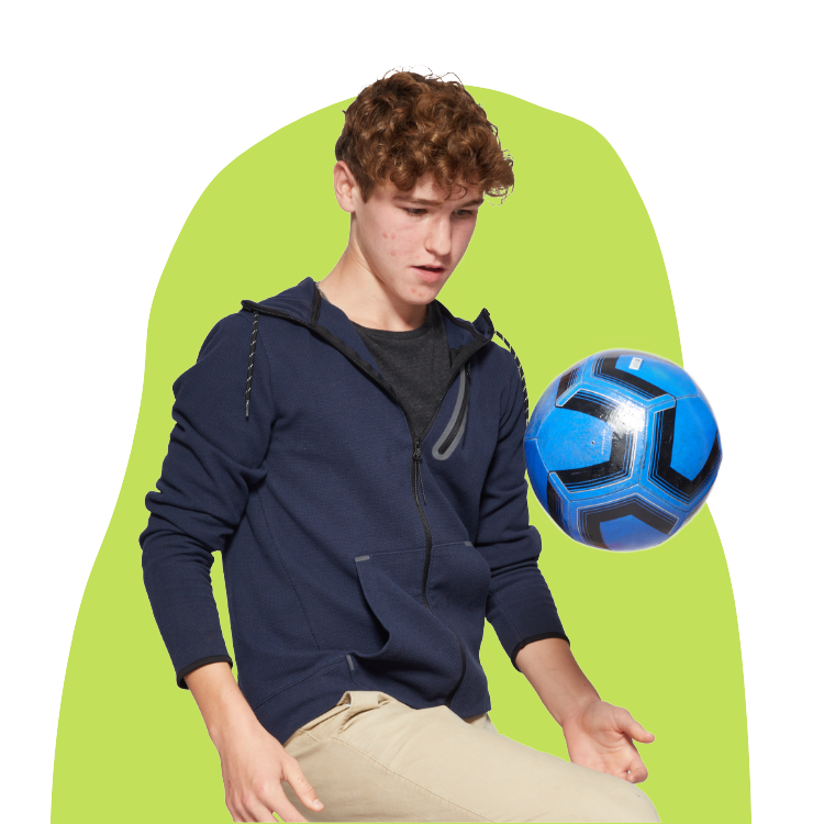 Boy with Hormonal Acne bouncing Soccer Ball on Knee